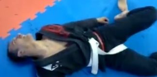 Black Belt chokes out white belt and leaves him