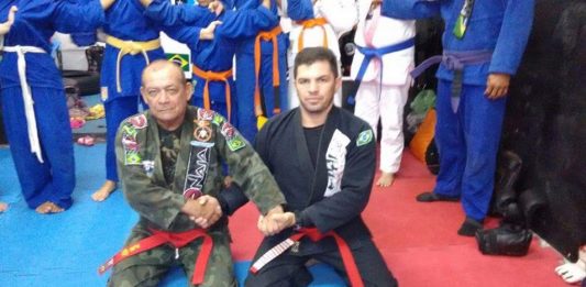 35 year old Clayton Silva promoted to a Red Belt by Ubitaran Cordeiro