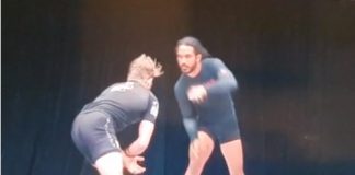 Watch Benson Henderson's Double Leg Taking Down AJ Agazarm and the Referee off the stage