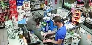 Gas Station Clerk Knocks Out and Subdues a Robber With A Guillotine Choke