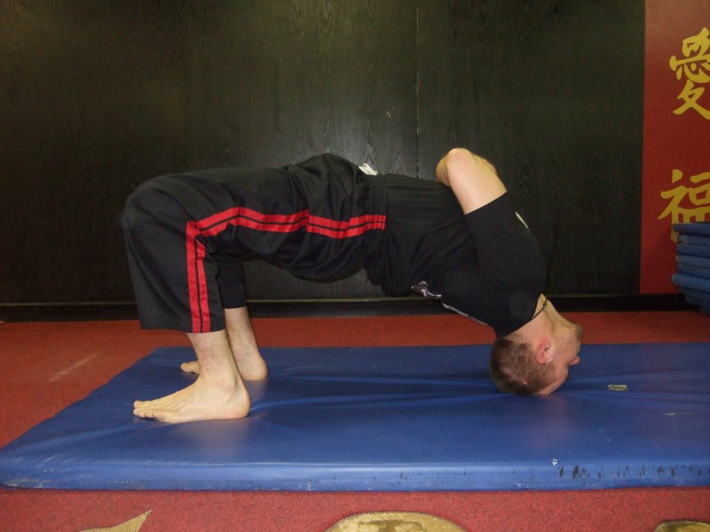 Neck bridging for fighters