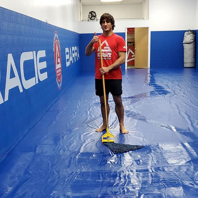 BJJ Hygiene cleaning the mats