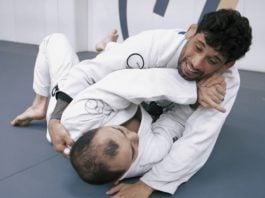 Escaping side control with an armlock