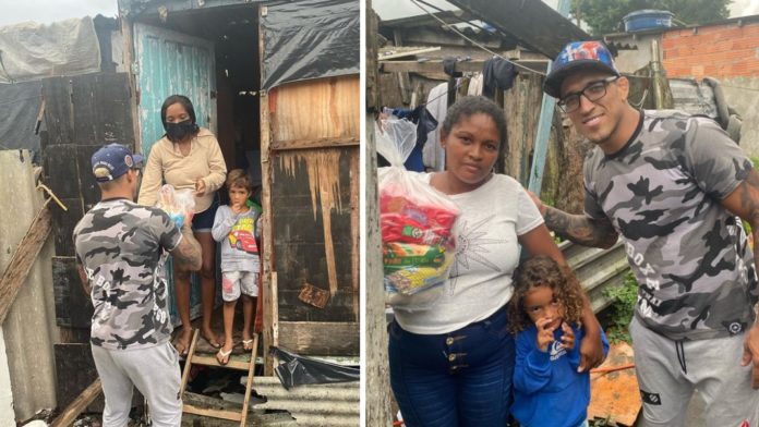 Charles Oliveira Donates and Personally Distributes food to brazilian community in need