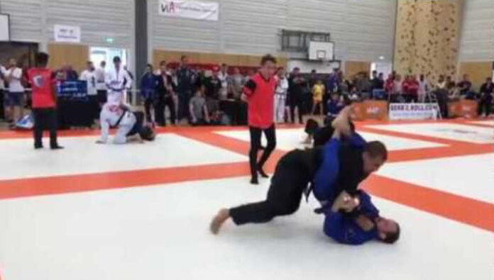 Black Belt puts himself into a triangle just to take back and submit his opponent