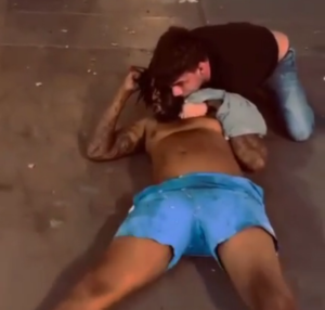 BJJ practitioner applies the Rear Naked Choke (RNC) on the aggressor.