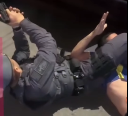 WATCH: Cop Holds Suspect In Armbar, Draws Gun